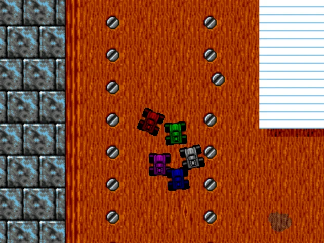 Colored cars on the top-down racing track